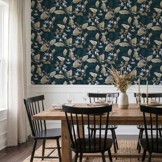 Eleanor Winter in dining room with black chairs