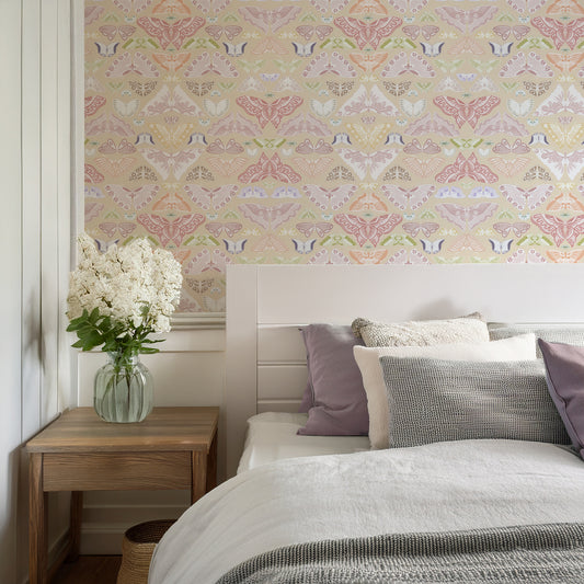 Iris Spring in bedroom with grey and purple pillows and white flowers