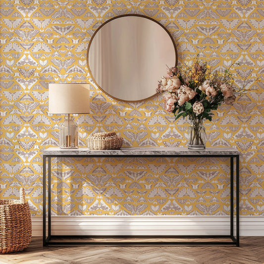 Iris Summer with large round mirror and a bouquet of flowers on sideboard