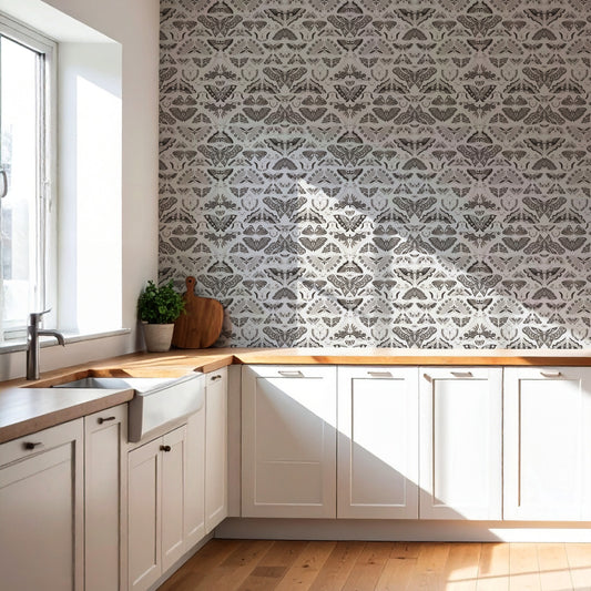 Iris Winter in kitchen with white cabinets and wooden chopping board