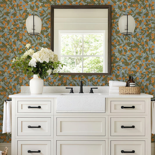 Marmalade Spring wallpaper in a white bathroom with a sink and a vase of flowers